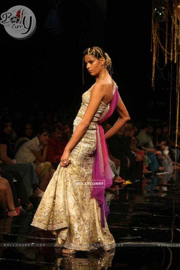 A model walks the runway at Rakesh Aggarwal show at the Lakme Fashion Week Spring/Summer 2010 Day 5, in Mumbai
