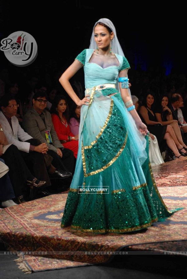 A model walks the runway at Tarun Tahiliani show at the Lakme Fashion Week Spring/Summer 2010 Day 5, in Mumbai