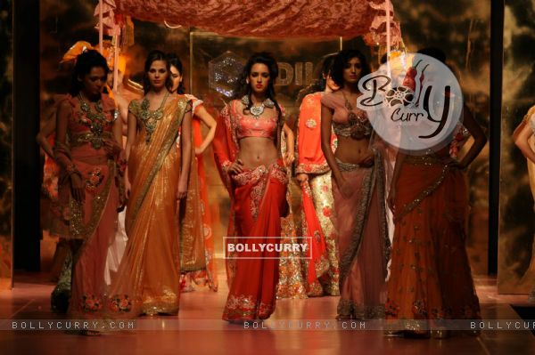 Models walk on the ramp for Pallavi Jaikishan at HDIL India Couture Week on Day 2