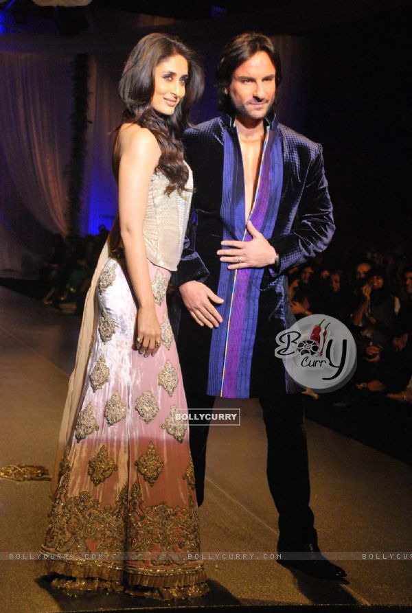 Bollywood''s star couple Kareena Kapoor and Saif Ali Khan walked the ramp in ensembles by designer Manish Malhotra at the HDIL India Couture Week in Mumbai Wednesday night