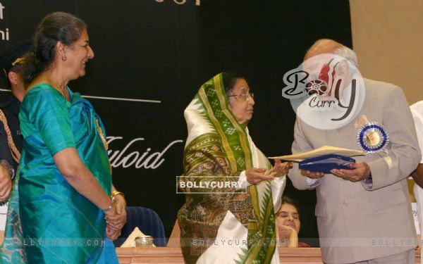 President Pratibha Devi Singh Patil presenting '''' 55th National film award to Yash Chopra on behalf of her son Aditya Chopra at Vigyan Bhawan, in New Delhi on Wednesday, also in photo I and B minister Ambika Soni