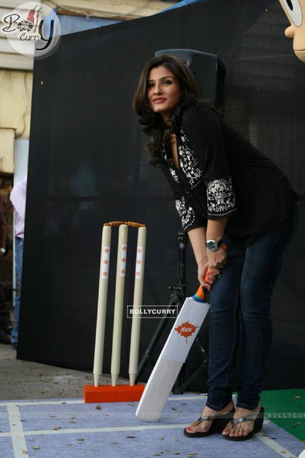 Bollywood Actor Raveena Tandon poses for the photographers during the announcement of Nickelodeon''s pioneering worldwide movement ''Let''s Just Play'' India''s first Play-a-thon in Mumbai on Friday, 23 October 2009