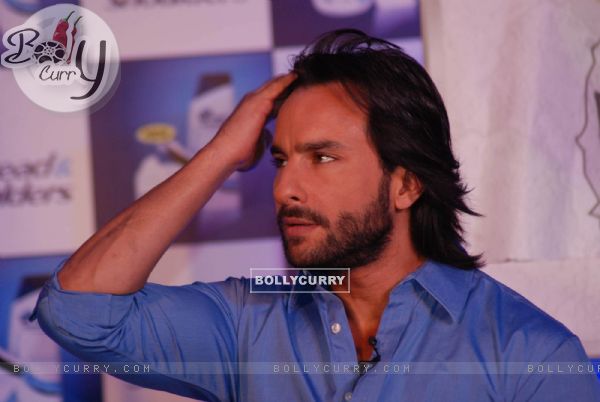 Bollywood Actor Saif Ali Khan poses for the photographers during the launch of ''New Head N Shoulders Scalp Massage Cream'' in Mumbai on Thursday, 29 October 2009