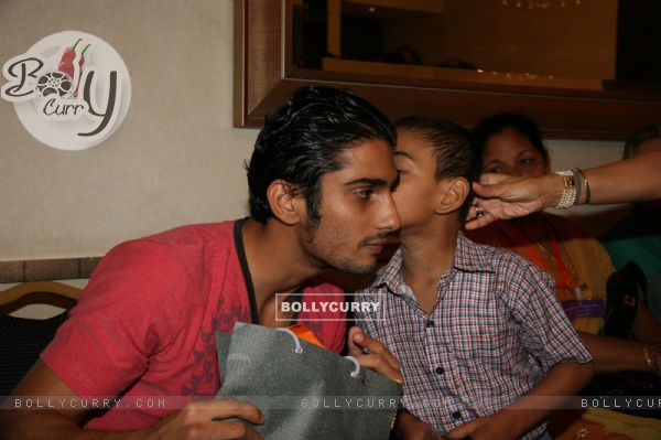 Bollywood actor Prateik Babbar posing for the photographers during an event at Asha Sadan Kids event in Mumbai on Wednesday, 11 November 2009