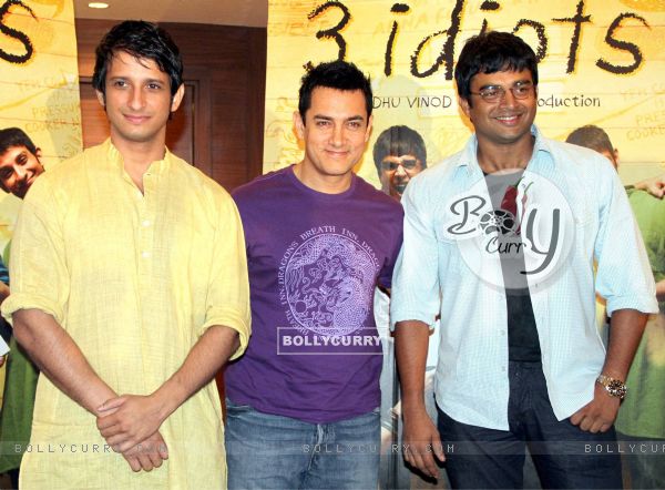 Actors Sharman Joshi, Aamir Khan and R Madhawan at a press-meet to promote their movie "3-Idiots'''', in New Delhi on Wednesday