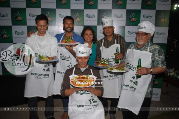 Model-turned-actors Milind Soman and Aryan Vaid turned chefs at "Carlsberg" event at Bandra,Mumbai