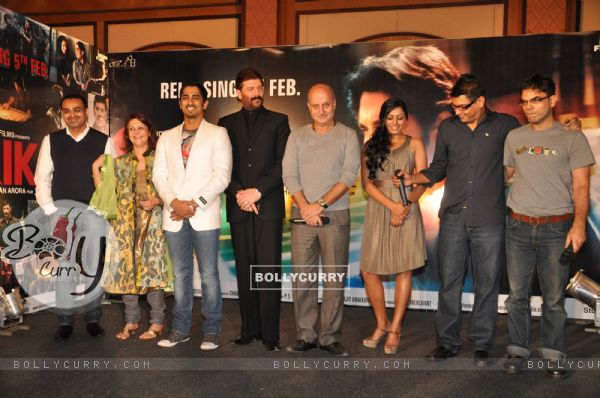 Bollywood actors Siddharth, Aditya Pancholi, and Anupam Kher at the music launch of "Striker" in Mumbai (83924)