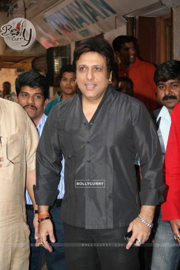 Bollywood Actor Govinda pose for the photographers during the press conference of Bhojpuri film "Nanihal" in Mumbai on Monday