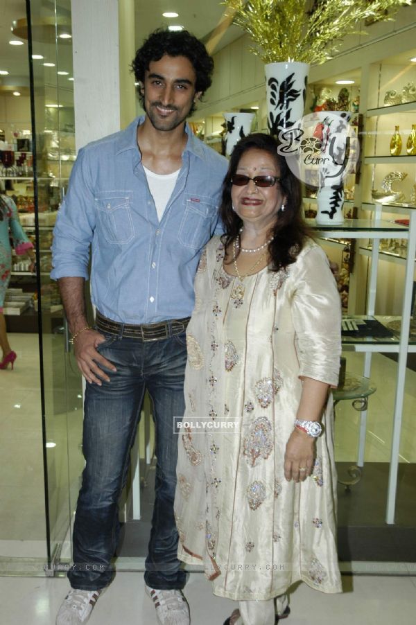 Bollywood actor Kunal Kapoor with a guest at the launch of "Tresorie" store in Oberoi Mall