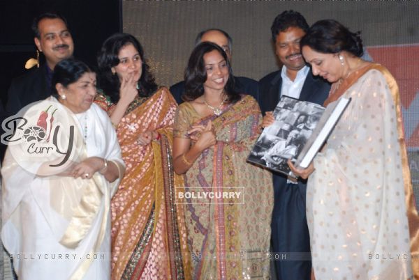 Lata Mangeshkar and Hema Malini at the launch of Gautam Rajadhyaksha''s book ''Chehere'' launch at JW Marriott