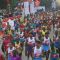 Participants during the Delhi Half Marathon, in New Delhi on Sunday