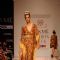 A model displays designer Priya Puri's creations during the Lakme Fashion Week day 4 in Mumbai. .