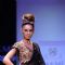A model displays designer Priya Puri's creations during the Lakme Fashion Week day 4 in Mumbai. .