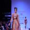 A model displays designer Priya Puri's creations during the Lakme Fashion Week day 4 in Mumbai. .