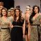 Model displays designer Priya Puri's creations during the Lakme Fashion Week day 4 in Mumbai. .