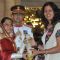 The President,Pratibha Devisingh Patil presenting the Padma Shri Award to Krishna Poonia, at an Investiture Ceremony II, at Rashtrapati Bhavan, in New Delhi