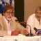 Film 'Aarakshan' director Prakash Jha with Amitabh Bachchan at a promotional event for his film