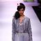Model displays designer VJ Balhara's creation during the Lakme Fashion Week Day 3 in Mumbai. .