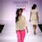 Model displays designer VJ Balhara's creation during the Lakme Fashion Week Day 3 in Mumbai. .