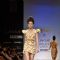 Model displays designer Pria Kataria Puri's creation during the Lakme Fashion Week Day 3 in Mumbai. .