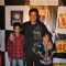 Lalit Pandit with kids at Premiere of film "Chaalis Chauraasi" in Cinemax, Mumbai