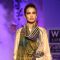 A model displays a creation by designer JJ Valaya during a special show at the Wills Lifestyle India Fashion week 2012,in New Delhi on Friday. .