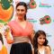 Rasna girl Avan Khambatta and Karisma Kapoor during the launch of 'Rasna-Ju-C'
