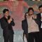 Shahrukh Khan and Siddharth Roy Kapoor clap as Raju Shrivastav speaks about their Film