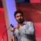 Mithoon Sharma receiving the award for Most popular song at the SAIFTA award ceremony