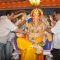 Randhir Kapoor and Rajiv Kapoor garland the idol of Lord Ganesha