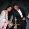 Nimrat Kaur and Akshay Kumar light the inaugral lamp at the Jagran Film Festival 2013
