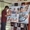 Shahid and Sonakshi pose alongside the R...Rajkumar comic during the promotions