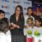 Sonakshi Sinha treats children to cake at a special screeing of Rio 2