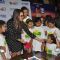 Sonakshi Sinha treats children to cake at a special screeing of Rio 2