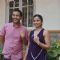 Chetan Bhagat and his wife pose with inked fingures
