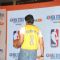 Abhishek Bachchan shows off his jersey at the Launch of NBA's first official online store in India