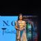 Rashmi Desai walks the ramp at the 'Caring with Style' fashion show at NSCI