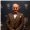 Anupam Kher poses for the Press