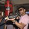 Suniel Shetty plays a shooting game at the Promotions of Desi Kattey