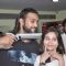 Akhil Kapur and Sasha Agha pose with a gun at the Promotions of Desi Kattey