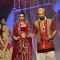 A bride and a groom walk the ramp at the IIJW 2014 - Day 2