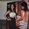 Surveen Chawla poses with the poster of Hate Story 2 at the Screening