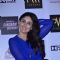 Kareena Kapoor smiles for the cameras at the Singham Returns Merchandise Launch