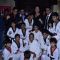 Tiger Shroff poses with the students