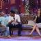 A fan performs an act for Ajay Devgn on Comedy Nights With Kapil