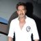 Ajay Devgn poses for the media at the Promotion of Singham Returns on Comedy Nights With Kapil