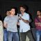 Makrand Deshpande offers the mike to Aamir Khan at the Premier of Saturday Sunday