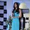 Diana Penty poses for the media with Tresseme product at the endorsement event
