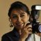 Rani Mukherjee poses with a Camera on World Photography Day