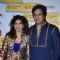 Talat and Bina Aziz pose for the media at Shaan's Live Concert